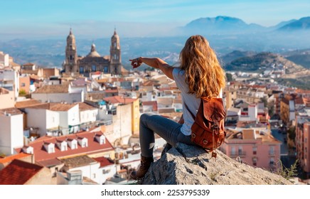 Woman tourist looking at Cathedral in Jaen- Andalusia in Spain