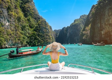 Woman tourist on boat trip, happy traveller relaxing at Pileh lagoon on Phi Phi island, Krabi, Thailand. Exotic landmark, destination Southeast Asia Travel, vacation and holiday concept - Shutterstock ID 2192515213