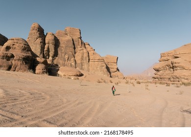 Woman Tourist On Vacation In The Biblical Landscape Of Jordan Desert