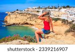 Woman tourist in Portugal- beautiful beach and village, Albufeira, Faro distric- Algarve