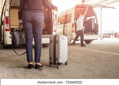 Woman Tourist Standing With Luggage With Pick Up Van At Airport