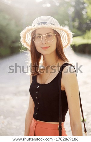 Similar – Woman, pretty, young, glasses, hat, upper body