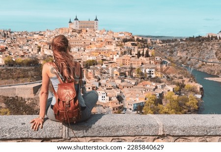 Woman tourist in Toledo looking at panoramic view of city- Spain