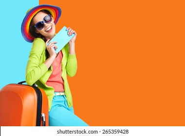 Woman Tourist With Travel Suitcase And Blue Boarding Pass, Isolated On Summer Background