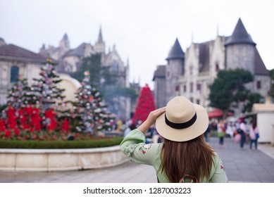Woman tourist is traveling at French village on Bana Hill in Danang, Vietnam.