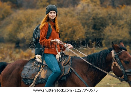 woman tourist traveling horse nature                          
