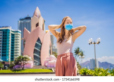 Woman Tourist In Vietnam, Nha Trang Put On A Medical Mask To Protect Herself From Coronovirus Infection COVID 19