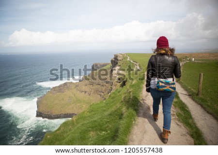 Similar – Image, Stock Photo Cliffs of Moher, woman, hiking