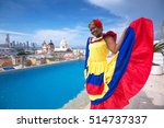 Woman in traditional costume against the backdrop of Cartagena de Indias, Colombia