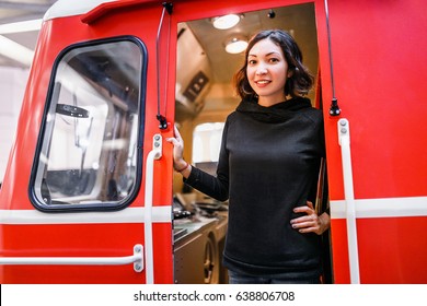 Woman Train Driver In Cabin