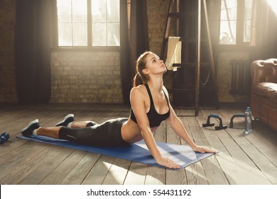 Woman Training Hard With Push Up Exercise In Her Gym