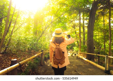 Woman Is Travel Into Nature Park.