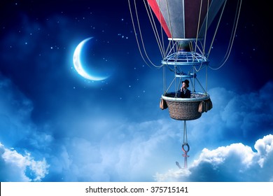 Woman traveling in aerostat