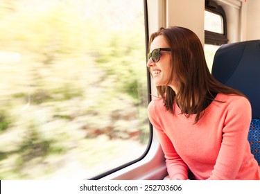 Woman Traveling On A Train