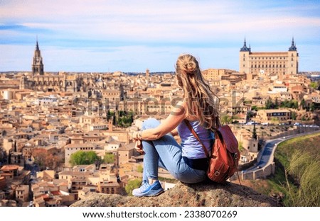 Woman travelling in Europa- Panoramic view of Toledo city in Spain