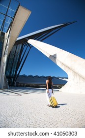 Woman With Trolley Outside The Lyon Airport