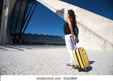 Woman With Trolley Outside The Lyon Airport