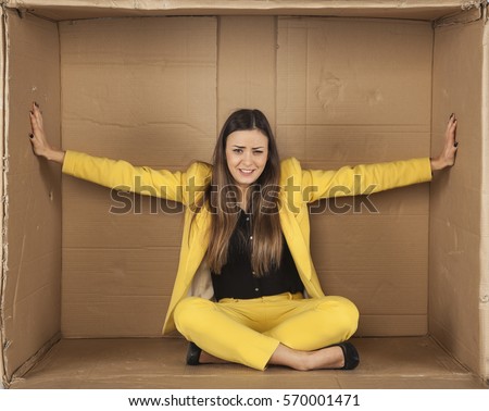 woman trying to enlarge the office space