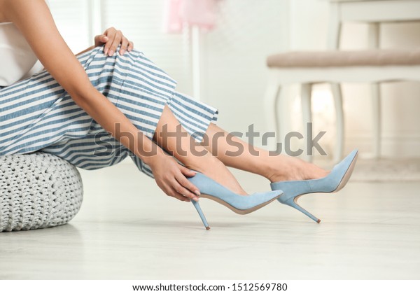Woman Trying On High Heel Shoes Stock Photo Edit Now 1512569780