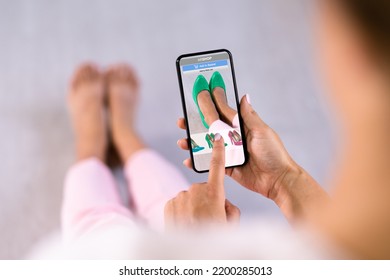 Woman Trying Virtual High Heel Shoes In Shop Or Store AR App