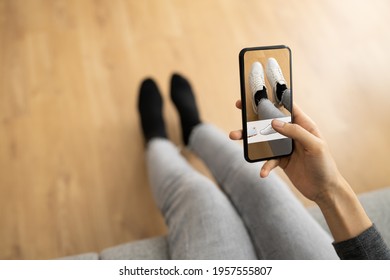 Woman Trying Virtual Sneakers In Shop Or Store AR App