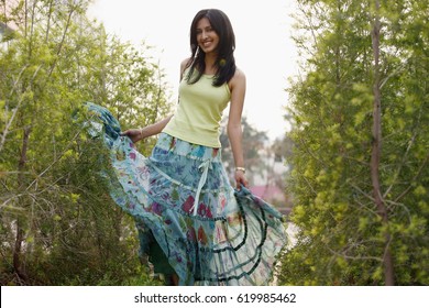 Woman Twirling In Skirt