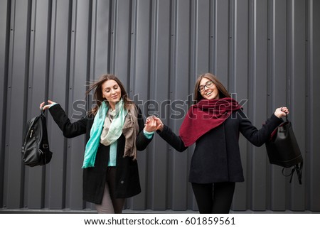 Similar – Image, Stock Photo happy twin sisters stand back to back