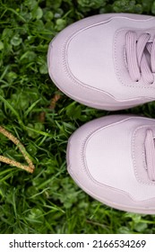 Woman Tying Shoe Laces. Closeup. Running Shoes