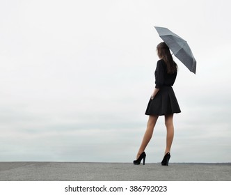 Woman With Umbrella