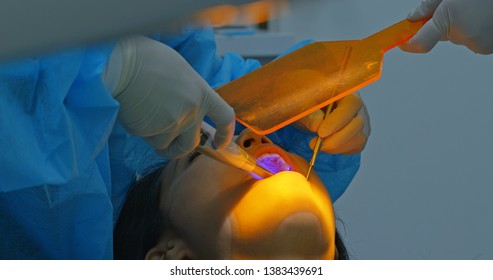 Woman Undergo Dental Check Up In Clinic