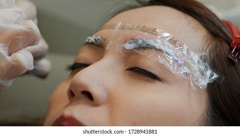 Woman Undergo Eyebrow Microblading, Permanent Makeup