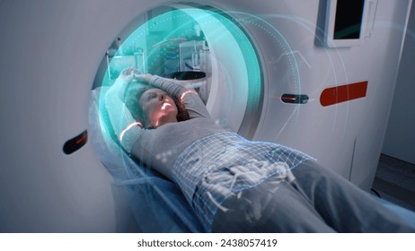 Woman undergoes MRI or CT scan procedure, lies on bed inside the machine. VFX animation of scanning brain and body of female patient. Advanced augmented reality equipment in modern medical lab with Ai - Powered by Shutterstock