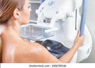 Woman Undergoing Medical Mammography Scan.