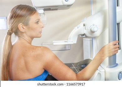 Woman undergoing scan test at hospital, sun rays coming from outside. - Shutterstock ID 1166573917