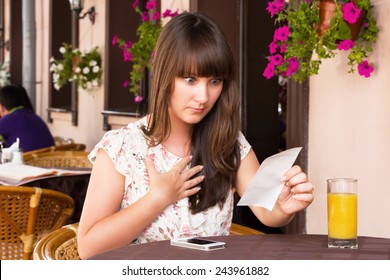 Woman unhappy amount of the invoice