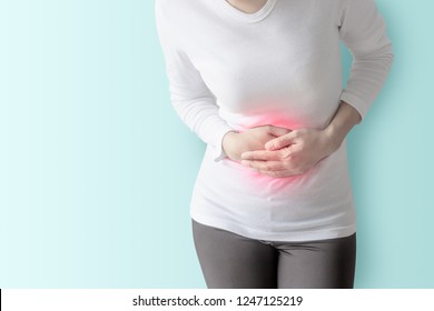 A Woman Is Unhappy With Stomach Ache Due To Constipation And Menstrual Cramps.