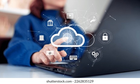 Woman uploading and transferring data from computer to cloud computing. Digital technology concept, data sheet management with large database capacity and high security.