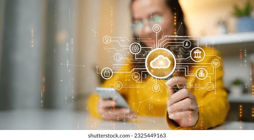 Woman uploading and transferring data from smartphone to cloud computing Digital technology concept, data sheet management with large database capacity and high security.