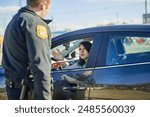 Woman, upset and traffic officer with ticket for checkpoint, security and crime investigation on highway. Police, law and driver registration for car accident, dui or road safety with guilty person