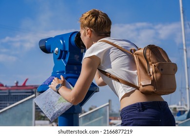 Woman Use Binoscope In The Barcelona Port. Blue City Binocular, Telescope For Town View