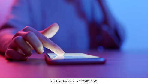 Woman use of cellphone - Shutterstock ID 1269817570