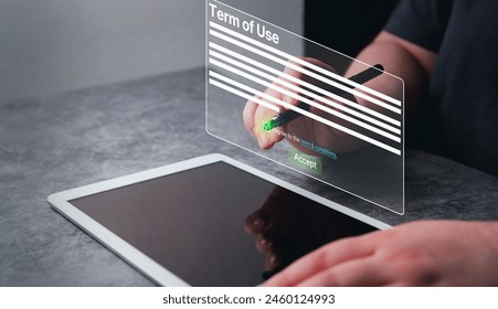 Woman use digital tablet to read terms and conditions of website or service before clicking button agree. Terms and conditions of contract concept.