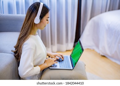 Woman Use Laptop With Greenscreen.