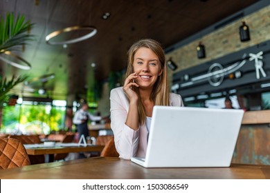 Woman use laptop. Student Researching Process Work. Young Business Woman Working Creative Coffee shop. Analyze market stock,new strategy. Horizontal.