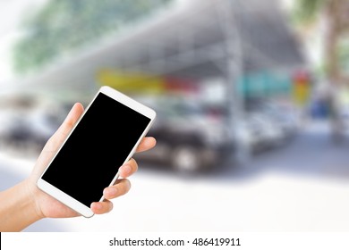 Woman Use Mobile Phone And Blurred Image Of Used Car Tent ,second Hand Cars For Sale