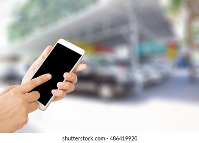 Woman Use Mobile Phone And Blurred Image Of Used Car Tent ,second Hand Cars For Sale