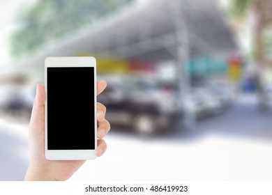 Woman Use Mobile Phone And Blurred Image Of Used Car Tent ,second Hand Cars For Sale