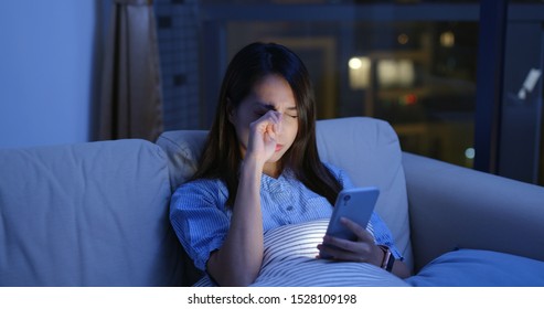 Woman Use Of Mobile Phone At Night And Feeling Eye Pain And Dry