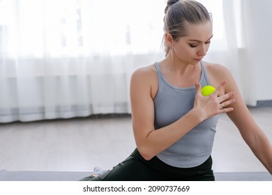 Woman Use Myofascial Release Massage Balls On Shoulder