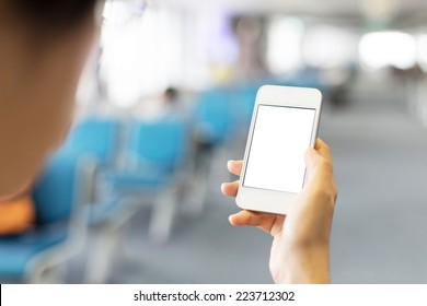 Woman Use Smart Phone In Airport In Airport